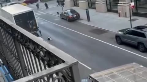 A driver flees NYC police destroying sidewalk.