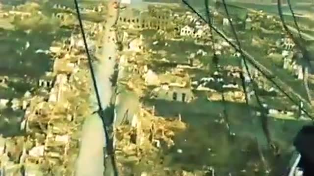 History - WW1 Color Footage Of Pilot Flying Over After Bombing