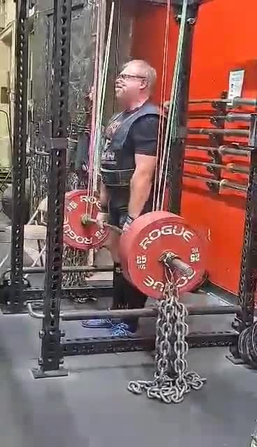 705 lb rack pull, plus 8 chains minus two bands