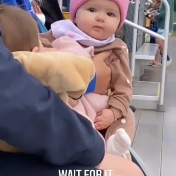 Look at her smile when her team scores points.