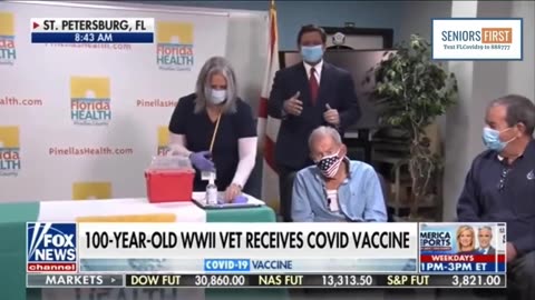 Ron DeSantis giving the Covid vaccine to a WWII veteran