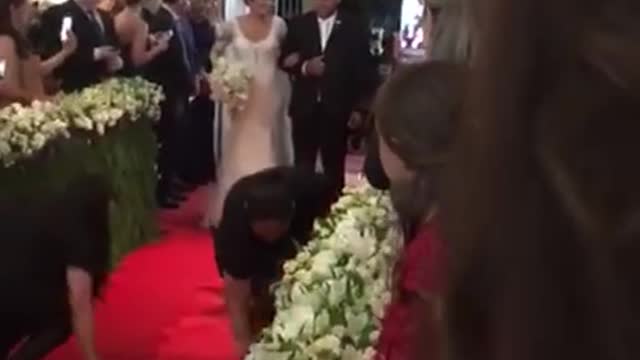 Guest Falls Over During Wedding Procession