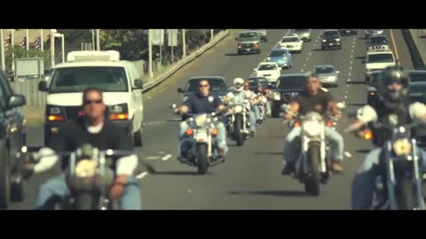 The horsemen riding the Harley galloped down the road like thousands of horses.