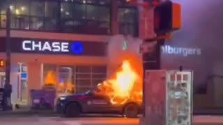 Police car ablaze as Antifa run riot across Atlanta.