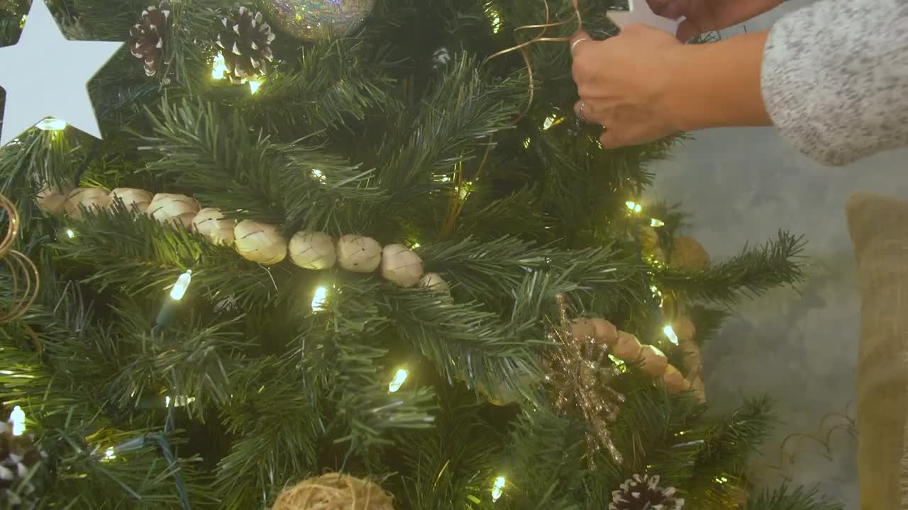 Decorating a Christmas tree