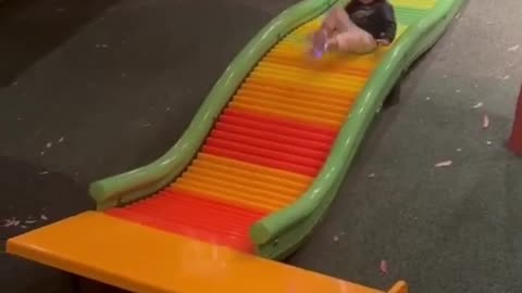 MELLIE ROLLS DOWN THE SLIDE!