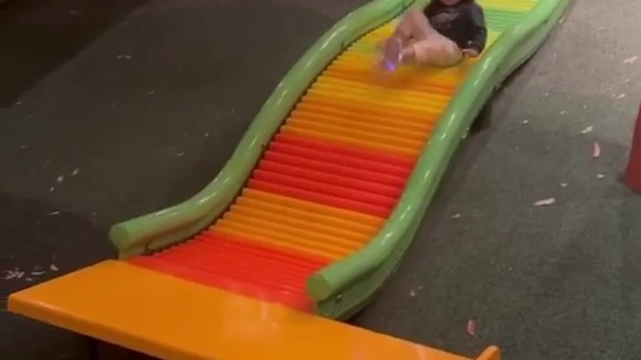 MELLIE ROLLS DOWN THE SLIDE!