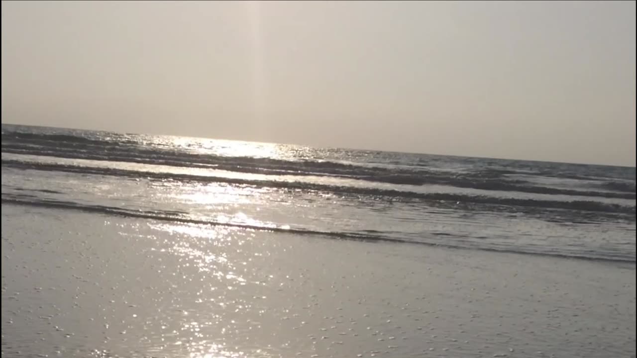 Sea movements waves sound bubbles moving on sand/ nature is beautiful