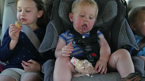 Ice cream treat, in the car seat.