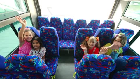 Diana and Roma teach School bus rules with friends