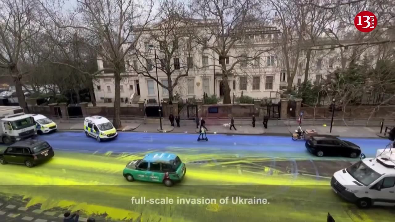 Ukraine flag painted on road outside Russian embassy in London