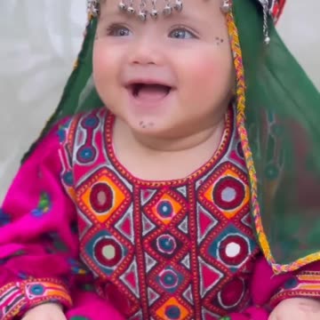 "Capturing the Magic: The Irresistible Allure of an Adorable Baby Smile"