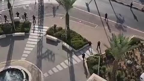 Palestinian fighters entering an Israeli Neighborhood