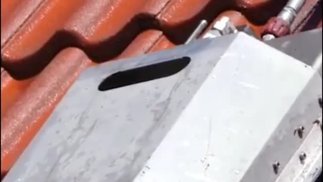 This gadget makes it easier and safer to clean your roof!