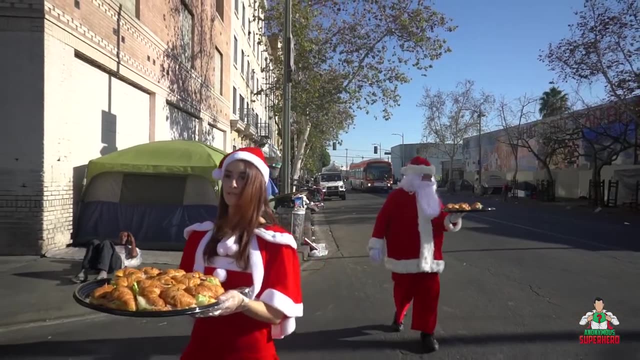 Anonymous Superhero 2023- Santa Claus and Mrs. Claus Feed The Homeless In True LA Style