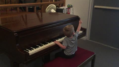 Jesse on the piano at Praise Assembly of God