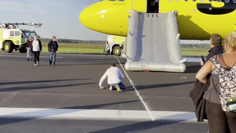 Engine Fire Prompts Emergency Plane Exit