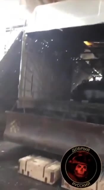 A closer look at a Russian tank with a full anti-drone shell