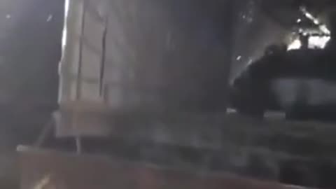 A closer look at a Russian tank with a full anti-drone shell