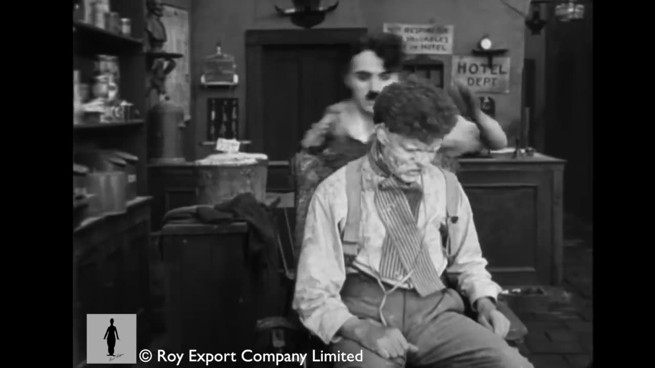 Charlie Chaplin at barber shop scene(Sunnyside) | Celebraty World