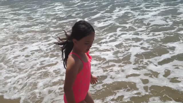 Topanga beach, California. My kiddo loves water.