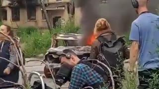 Zelensky media shooting an "atrocity scene" in Ukraine.