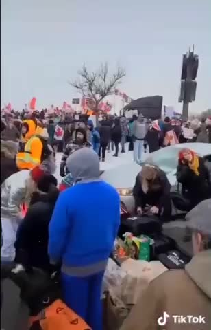 People came out to provide foods support to the truckers on the way to Ottawa Canada