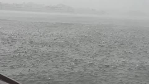 The pitter-patter of raindrops serenades the earth, painting the world in shades of gray and green.