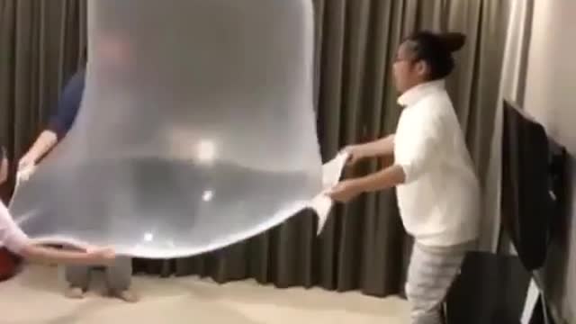 Girls Make Giant Bubble with Slime