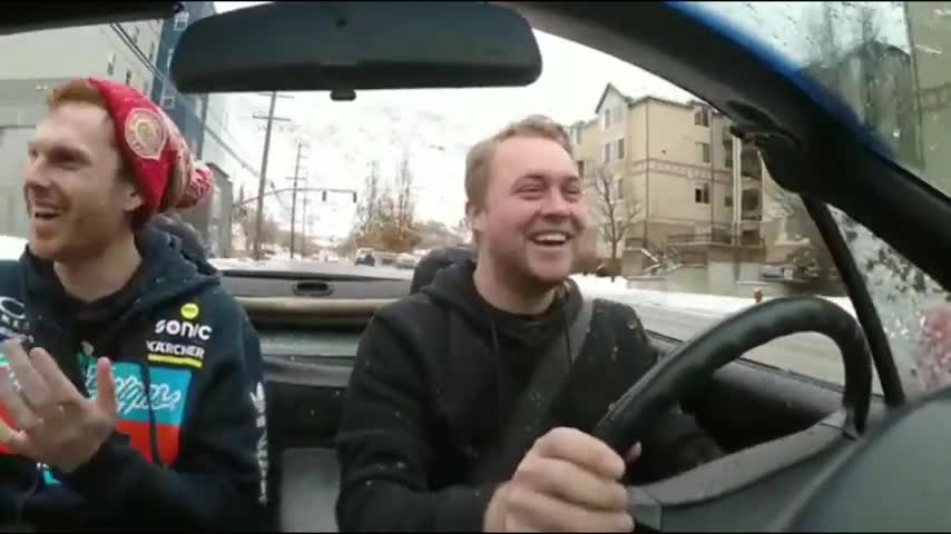 Guys Get Splashed with Snow Slush in Top Down Convertible