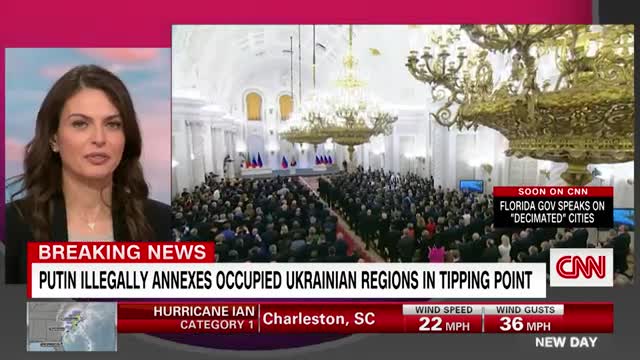 Hear what CNN reporter noticed about crowd watching Putin's speech