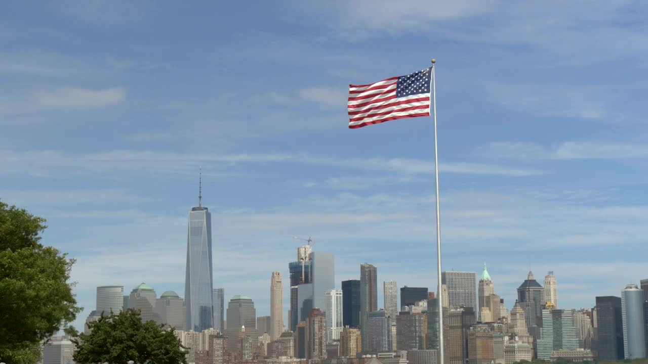 USA Flag Flying infront of New York Skyline