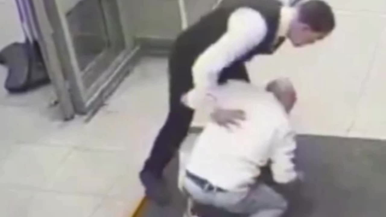 Coward with a knife is stopped by a security guard