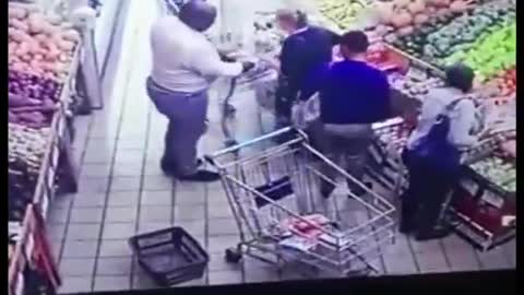 TWO BLACK MEN ROB AN OLD WHITE WOMAN IN A SUPERMARKET