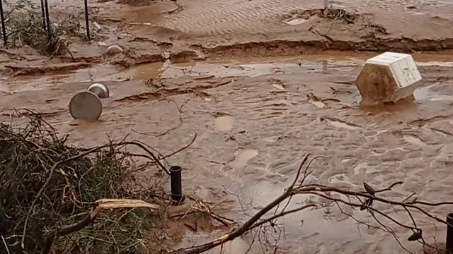 Flash Flooding Turns Streets Into Raging Torrents