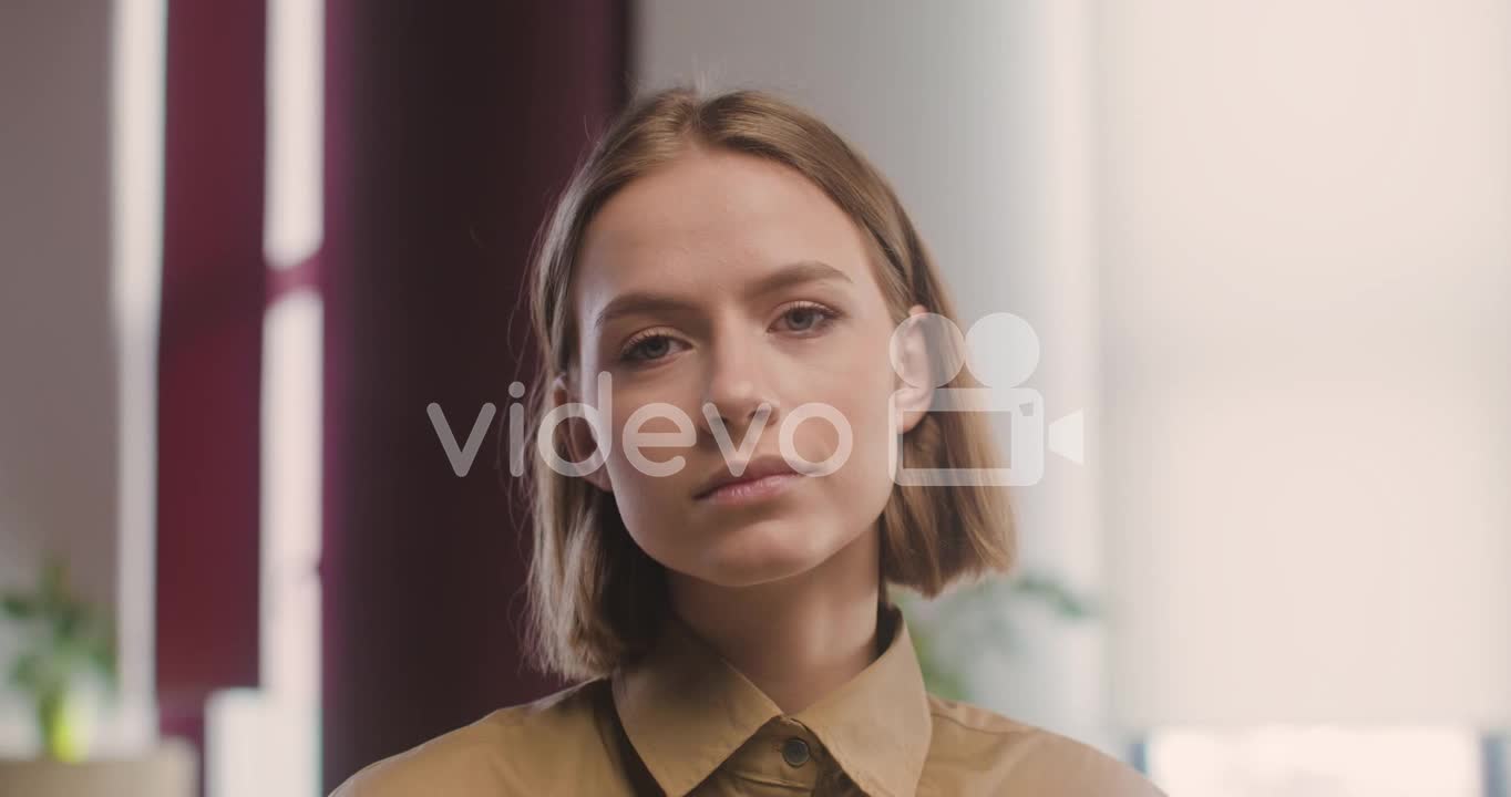 Close Up View Of Woman Looking At Camera