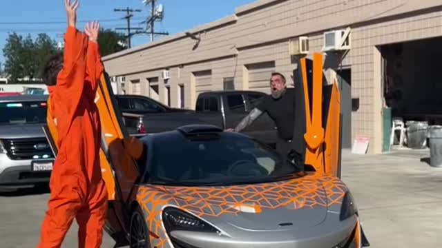 I put a brick on Mclaren $500,000 supercar