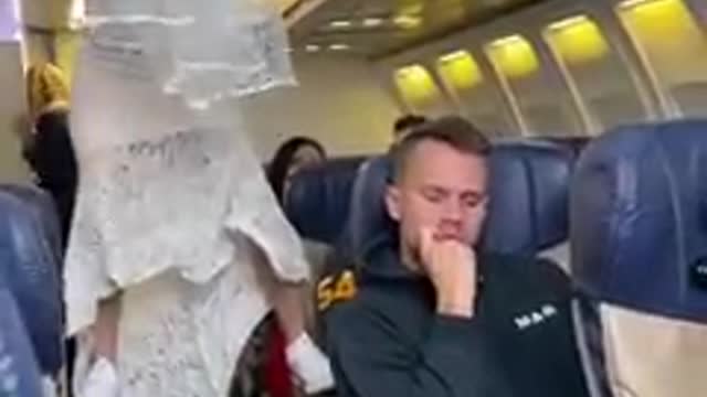 Bride gets aggressive on Airplane- part 1