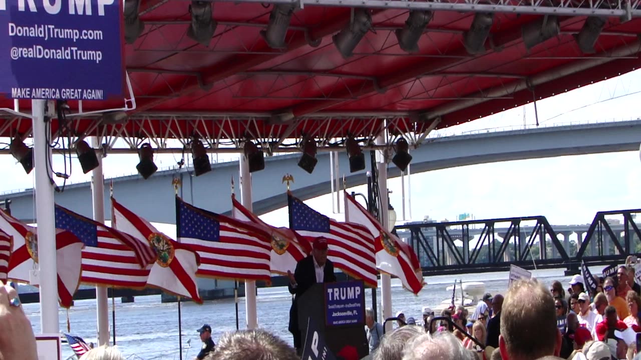 Trump Rally under a blue sky at the Jacksonville Landing Build the wall