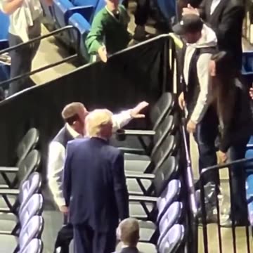 President Donald Trump at the NCAA Division I Wrestling Championships in Tulsa, Oklahoma