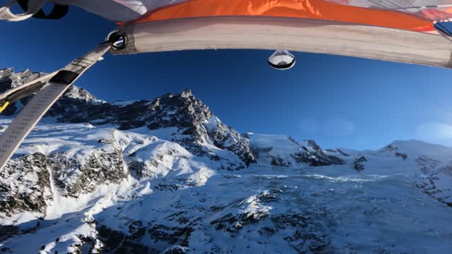 Ski-BASE Jumping off an Ice Cliff