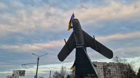 A Ukrainian flag flies from a Soviet-era plane in Bakhmut, Ukraine