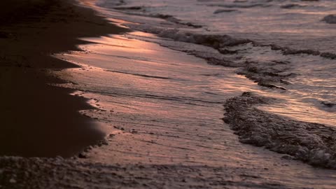 Evening waves on the beach, 1 minute