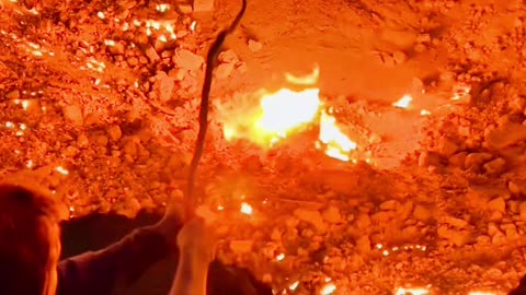 Cooking sausages on the mouth of a volcano