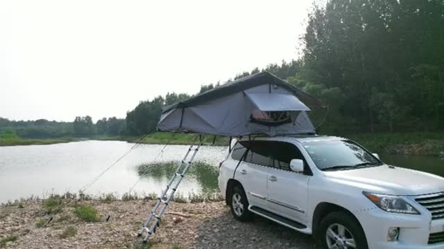 Hot girl and camping rooftop tent. Nice glamping