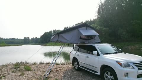Hot girl and camping rooftop tent. Nice glamping