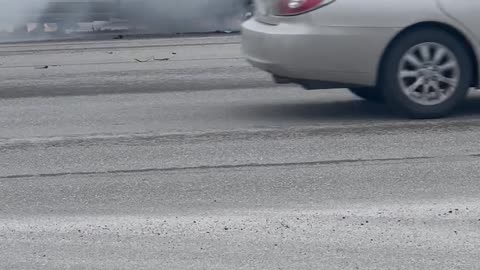 Smoke Billows From Truck