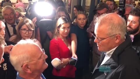 Scott Morrison confronted by locals at Edgeworth pub