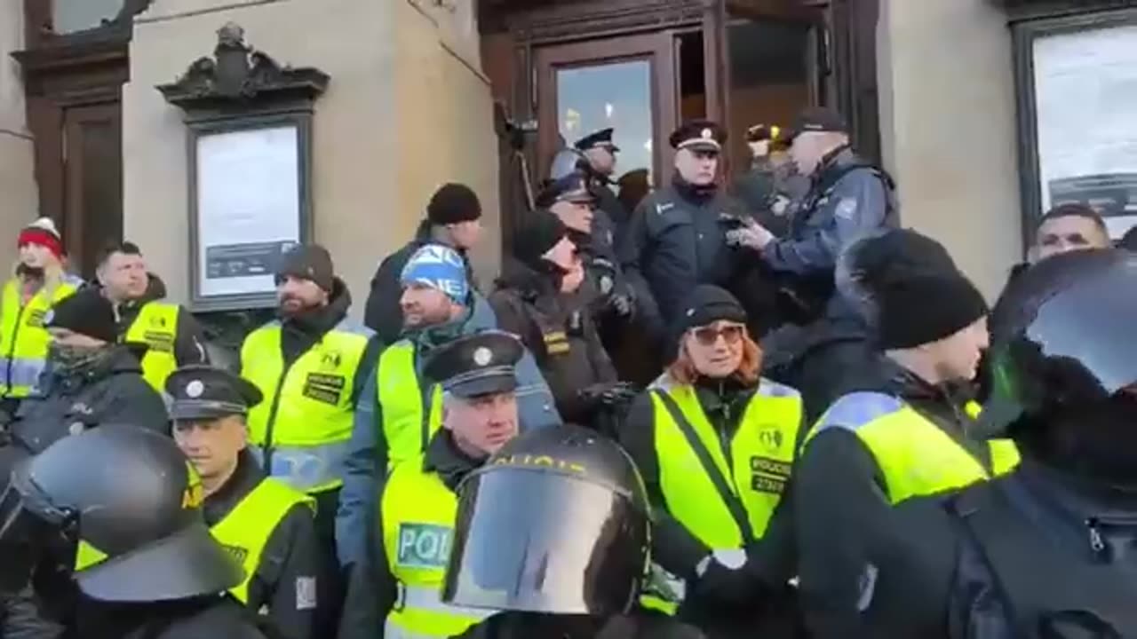 The Czech Republic: Czechs clash with police as they try to take down the Ukrainian flag...