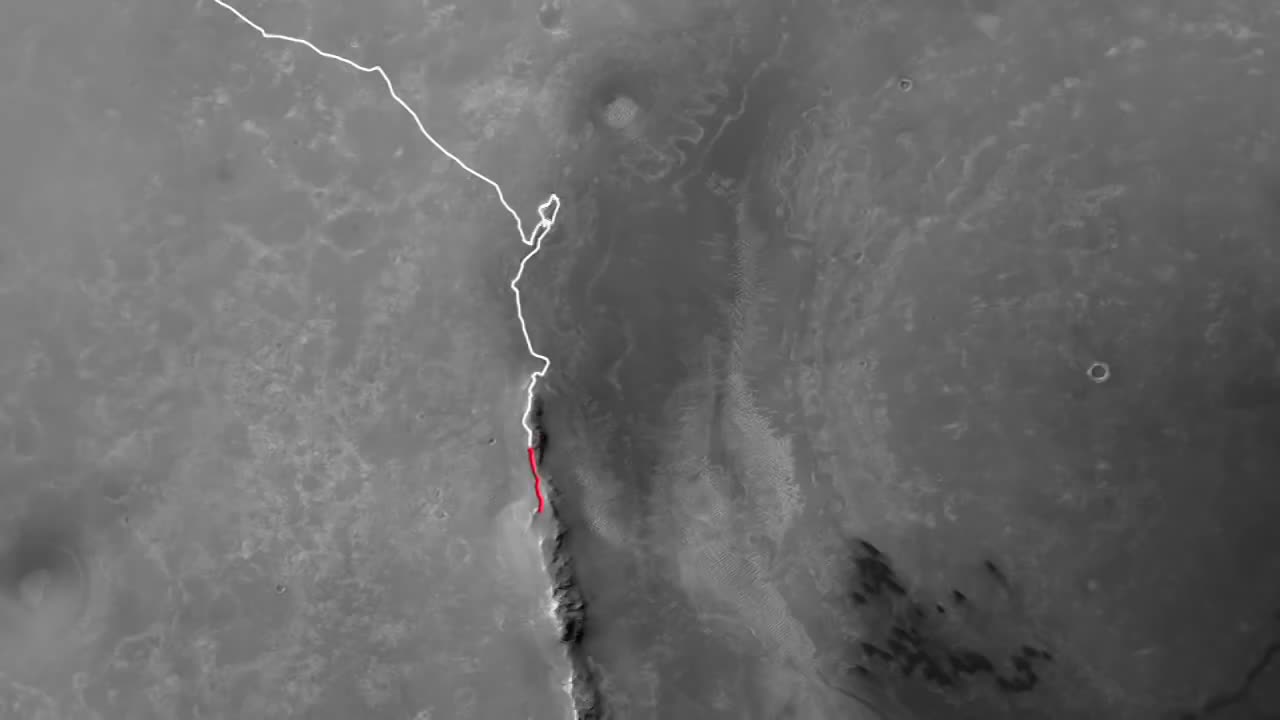 Mars rover looks back at tracks on crater rim